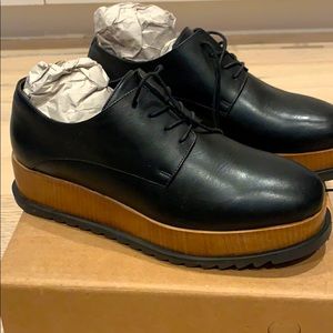 Black leather, platform shoes